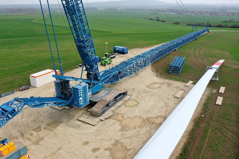 Liebherr crawler crane with a long lattice boom on a job site
